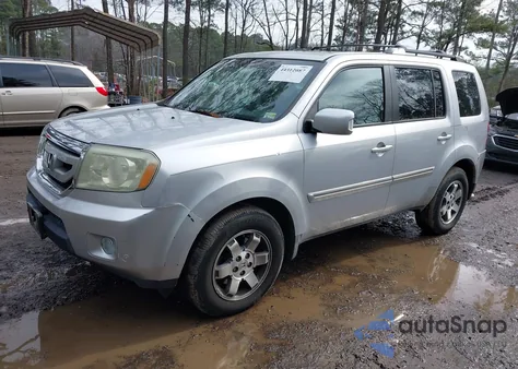 2010 Honda Pilot Touring z USA, uszkodzony, nr VIN 5FNYF4H94AB026325